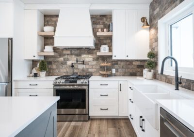 Simple white cabinets, Chelsey Grey Island with White Oak Accents at 23 Applewood Court